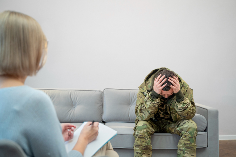 person suffering from ptsd at psychologist